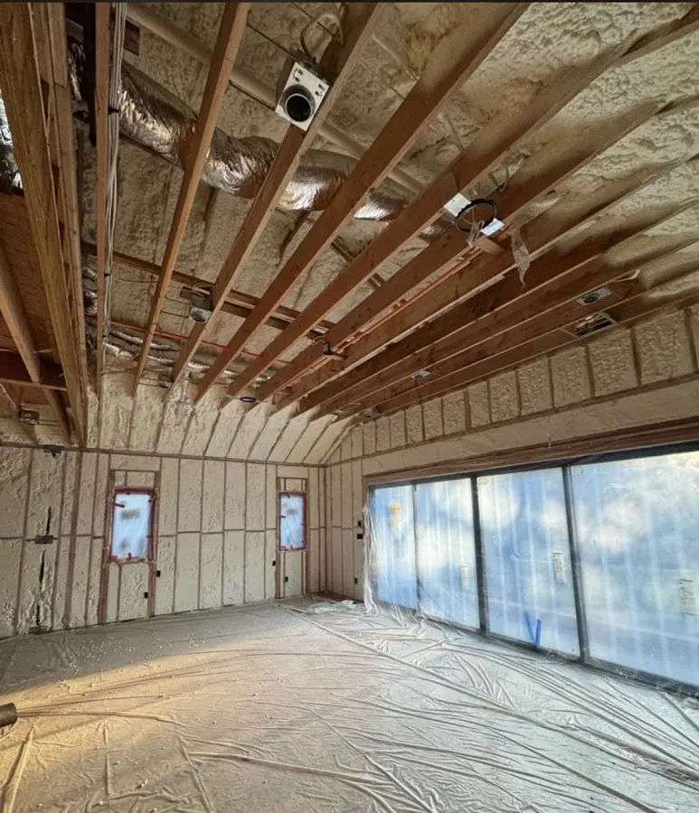 Interior walls and ceiling insulated with spray foam during new construction in Amelia